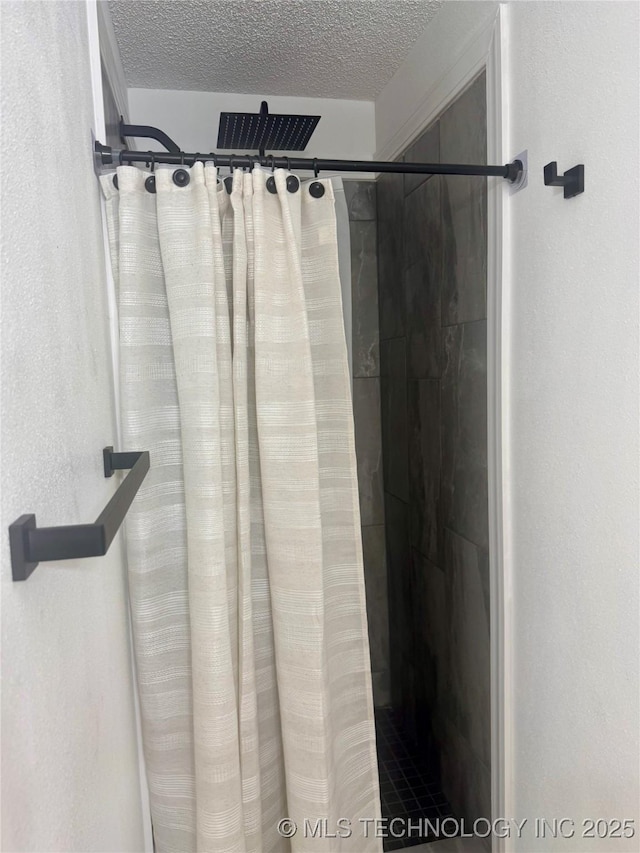 449734 E 356th Rd, Afton, OK 74331 - full bathroom featuring a shower stall and a textured ceiling
