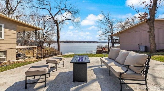 449734 E 356th Rd, Afton, OK 74331 - view of patio / terrace featuring an outdoor living space with a fire pit and a water view