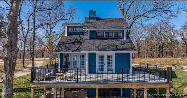 449734 E 356th Rd, Afton, OK 74331 - view of side of home featuring french doors, a deck, a chimney, a shingled roof, and a yard