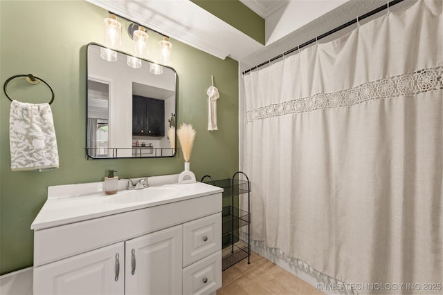 6353 S 80th E Ave Unit 1A, Tulsa, OK 74133 - bathroom with crown molding, tile patterned floors, and vanity