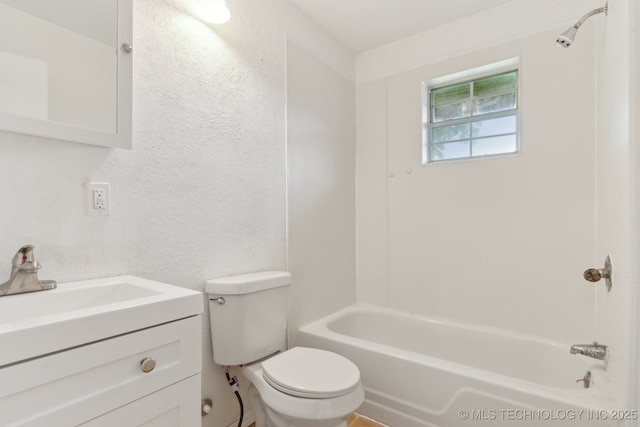 9590 S 4240th Rd, Chelsea, OK 74016 - bathroom with a textured wall, toilet, vanity, and bathtub / shower combination