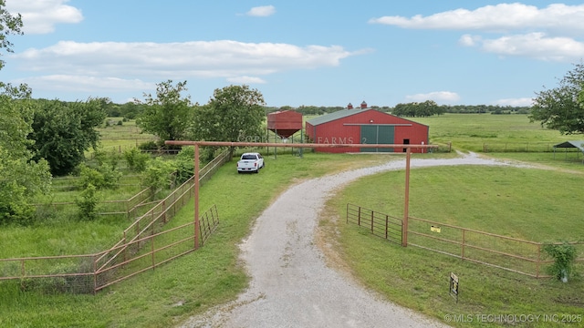 9590 S 4240th Rd, Chelsea, OK 74016 - view of road featuring a view of countryside, an outbuilding, and a gated entry