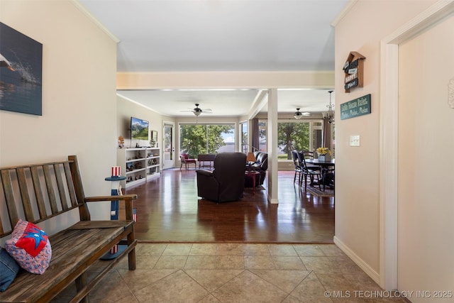 59144 E 290th Rd, Grove, OK 74344 - living area featuring ceiling fan, tile patterned flooring, crown molding, and baseboards