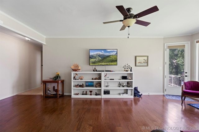 59144 E 290th Rd, Grove, OK 74344 - living room with wood finished floors, ornamental molding, baseboards, and a ceiling fan