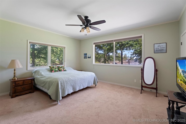 59144 E 290th Rd, Grove, OK 74344 - bedroom with light carpet, baseboards, crown molding, and ceiling fan