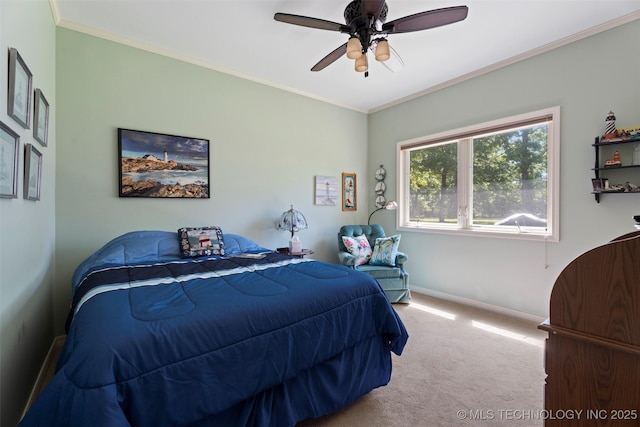 59144 E 290th Rd, Grove, OK 74344 - carpeted bedroom featuring baseboards, ornamental molding, and ceiling fan
