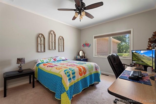 59144 E 290th Rd, Grove, OK 74344 - carpeted bedroom featuring baseboards, an office area, ornamental molding, and a ceiling fan