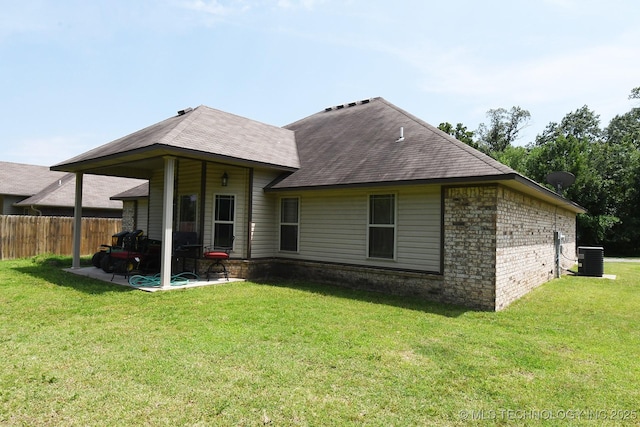 114 Stone, Roland, OK 74954 - rear view of house with a patio area, roof with shingles, brick siding, and cooling unit