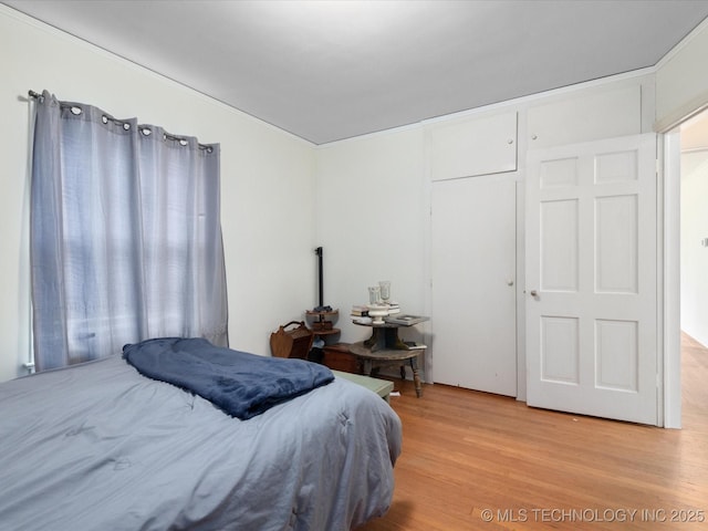 1724 Cherokee Pl, Bartlesville, OK 74003 - bedroom with light wood finished floors