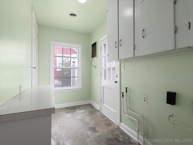1724 Cherokee Pl, Bartlesville, OK 74003 - doorway to outside featuring concrete flooring and baseboards