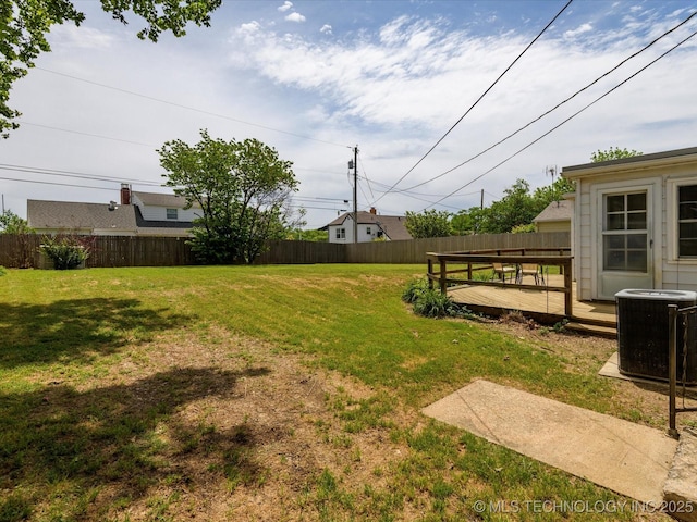 1724 Cherokee Pl, Bartlesville, OK 74003 - view of yard with central AC and a deck