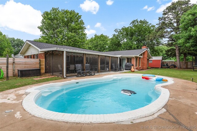 11837 S 84th Ave E, Bixby, OK 74008 - view of pool featuring a sunroom and a patio area