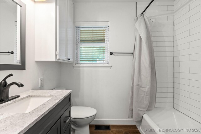 11837 S 84th Ave E, Bixby, OK 74008 - full bath featuring toilet, wood finished floors, vanity, baseboards, and shower / tub combo with curtain