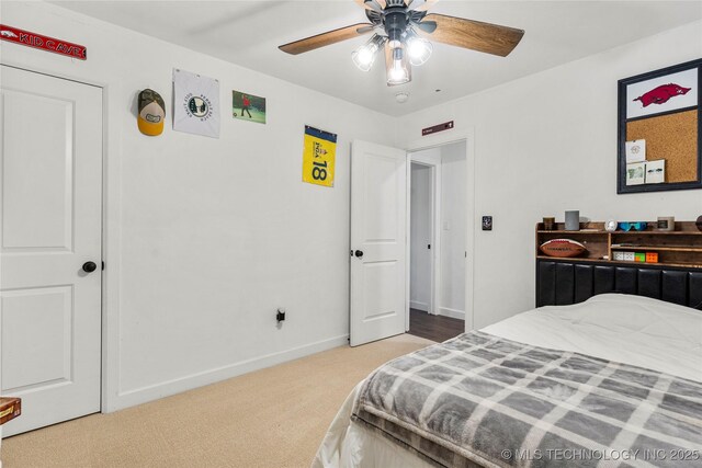 11837 S 84th Ave E, Bixby, OK 74008 - carpeted bedroom with baseboards and a ceiling fan