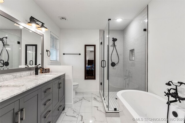11837 S 84th Ave E, Bixby, OK 74008 - bathroom with a shower stall, marble look tile flooring, double vanity, a soaking tub, and baseboards