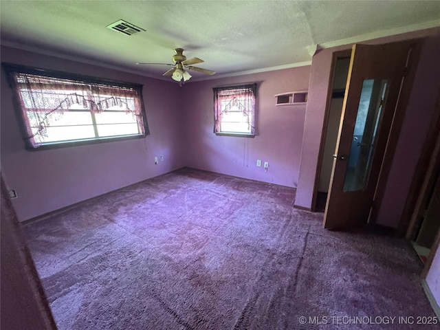 31206 E 683rd St, Wagoner, OK 74467 - carpeted empty room with ceiling fan, ornamental molding, and a textured ceiling