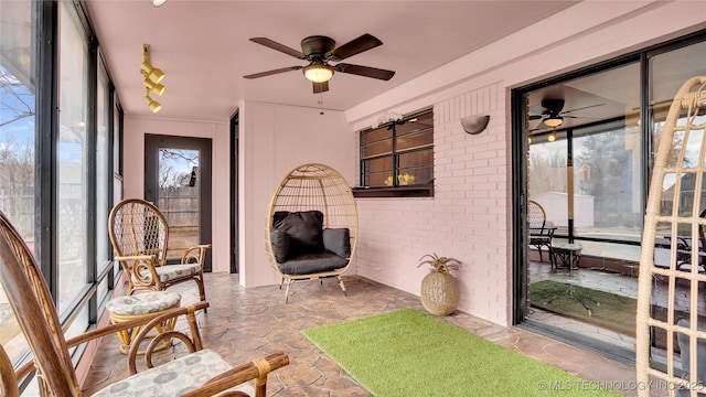 2014 12th Ave NW, Ardmore, OK 73401 - sunroom / solarium featuring plenty of natural light and ceiling fan