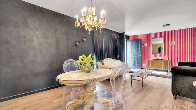 2014 12th Ave NW, Ardmore, OK 73401 - dining area featuring a chandelier and wood finished floors