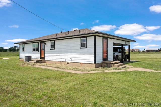 24708 E 18th Rd, Vinita, OK 74301 - back of property featuring crawl space, central AC, and a yard