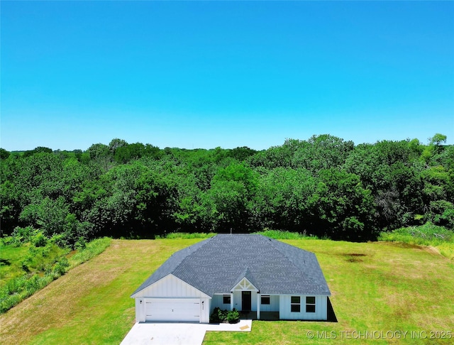 345 Kats, Durant, OK 74701 - view from above of property featuring a forest