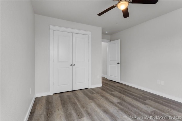345 Kats, Durant, OK 74701 - unfurnished bedroom with wood finished floors, baseboards, and a closet