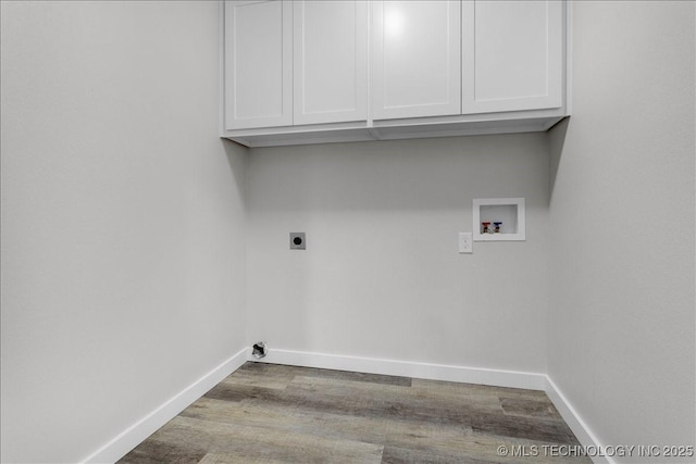 345 Kats, Durant, OK 74701 - laundry area featuring hookup for a washing machine, cabinet space, wood finished floors, electric dryer hookup, and baseboards