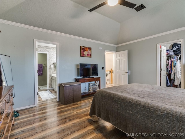 1821 N 11th St, Broken Arrow, OK 74012 - bedroom with wood finished floors, crown molding, ensuite bathroom, ceiling fan, and a spacious closet