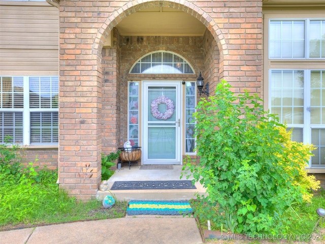 1821 N 11th St, Broken Arrow, OK 74012 - doorway to property with brick siding