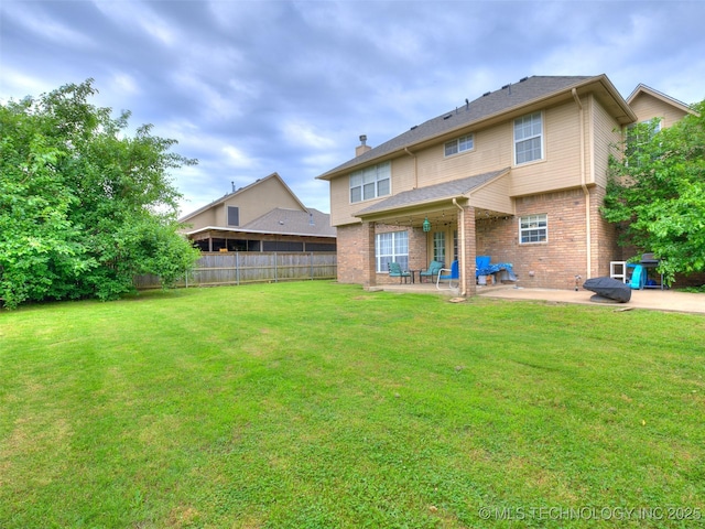 1821 N 11th St, Broken Arrow, OK 74012 - rear view of house featuring a patio area and brick siding