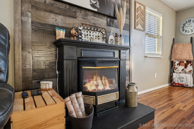 10180 S 241st W Ave, Sapulpa, OK 74066 - detailed view of a lit fireplace, wood finished floors, and baseboards
