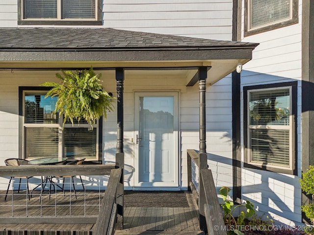 10180 S 241st W Ave, Sapulpa, OK 74066 - doorway to property featuring a porch and a shingled roof