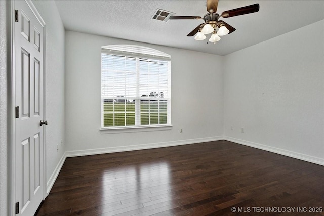 2259 E Rodeo Rd, Durant, OK 74701 - unfurnished bedroom with wood finished floors and baseboards