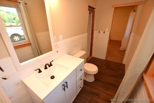 98926 S 4610th Rd, Marble City, OK 74945 - bathroom featuring vanity, toilet, wainscoting, and wood finished floors