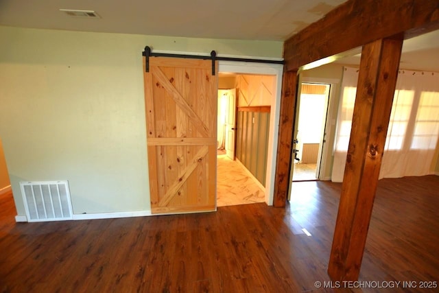98926 S 4610th Rd, Marble City, OK 74945 - spare room featuring dark wood-style flooring and a barn door