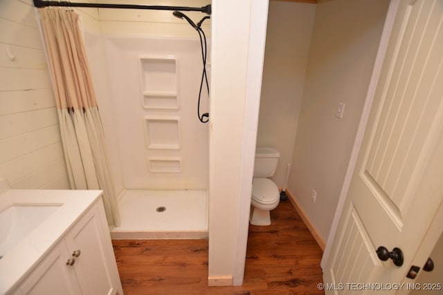 98926 S 4610th Rd, Marble City, OK 74945 - full bathroom with a shower stall, wood finished floors, toilet, and vanity