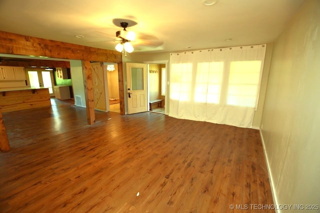 98926 S 4610th Rd, Marble City, OK 74945 - unfurnished living room featuring wood finished floors, ceiling fan, and baseboards