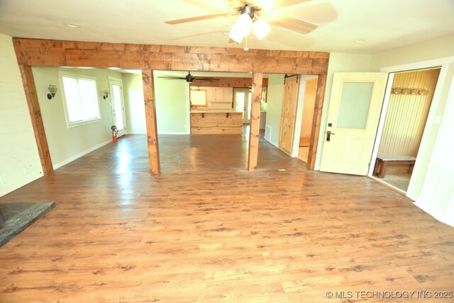 98926 S 4610th Rd, Marble City, OK 74945 - unfurnished room featuring a ceiling fan and wood finished floors