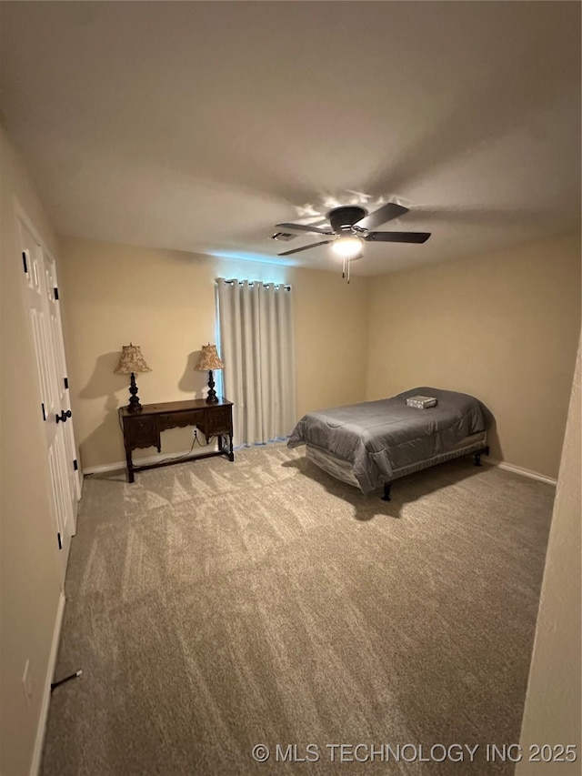 7604 N 127th E Ave, Owasso, OK 74055 - bedroom featuring carpet, baseboards, and a ceiling fan