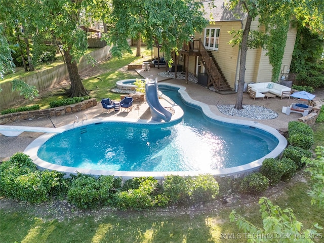 8721 S 65th E Pl, Tulsa, OK 74133 - view of swimming pool with stairs, a patio, a fenced backyard, a deck, and outdoor lounge area