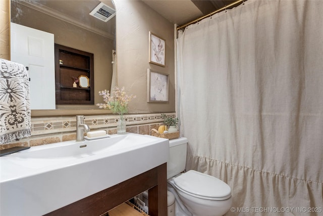 8721 S 65th E Pl, Tulsa, OK 74133 - bathroom with toilet and vanity