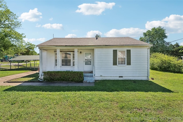 315 N Main St, Owasso, OK 74055 - bungalow-style house with a front yard, crawl space, roof with shingles, and a porch