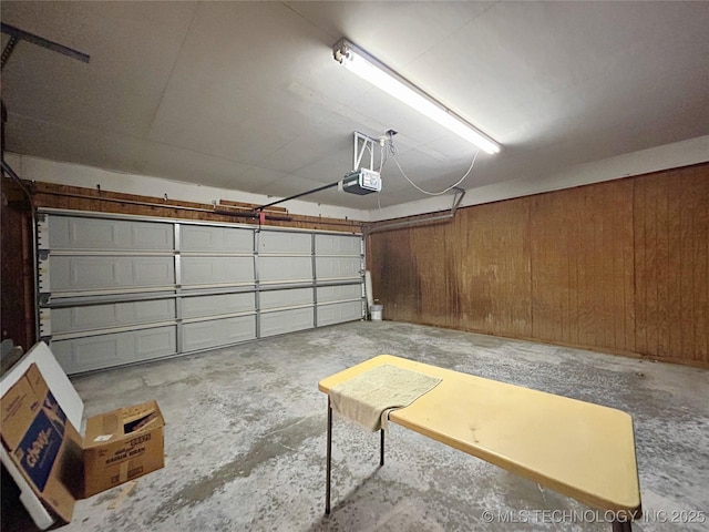 502 W Elm St, Henryetta, OK 74437 - garage featuring a garage door opener