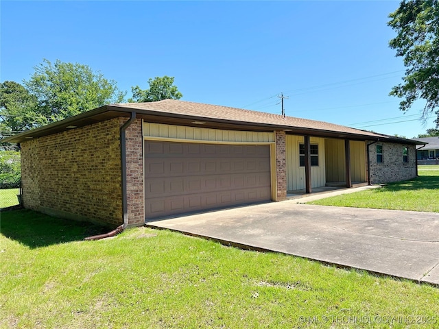 502 W Elm St, Henryetta, OK 74437 - ranch-style home featuring driveway, an attached garage, brick siding, and a front lawn
