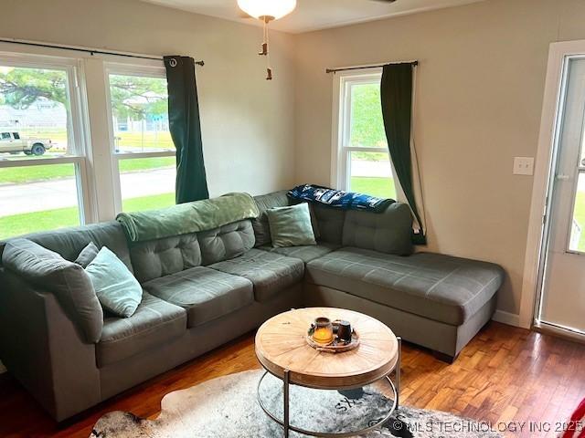 2201 Baugh St, Muskogee, OK 74403 - living area featuring plenty of natural light and wood finished floors