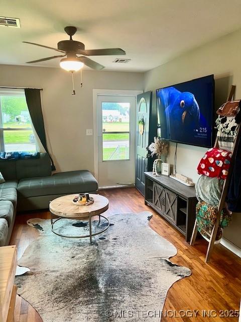 2201 Baugh St, Muskogee, OK 74403 - living room featuring ceiling fan and wood finished floors