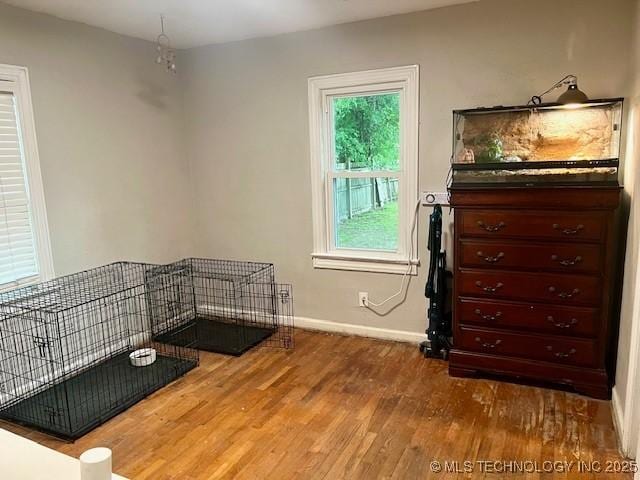 2201 Baugh St, Muskogee, OK 74403 - bedroom with wood finished floors and baseboards