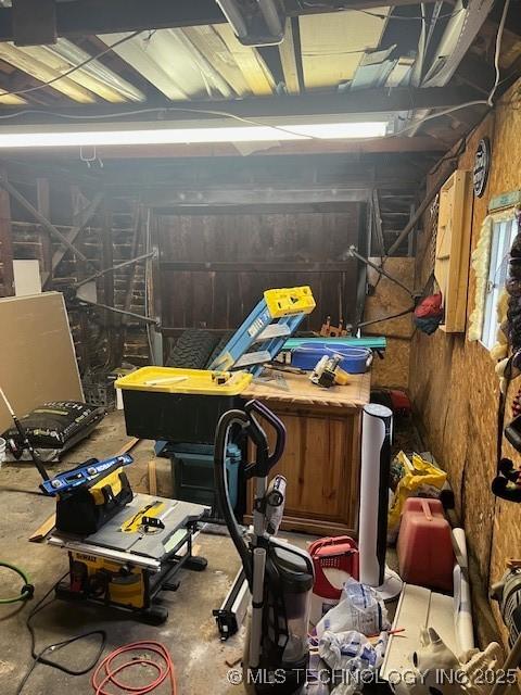2201 Baugh St, Muskogee, OK 74403 - garage featuring wooden walls