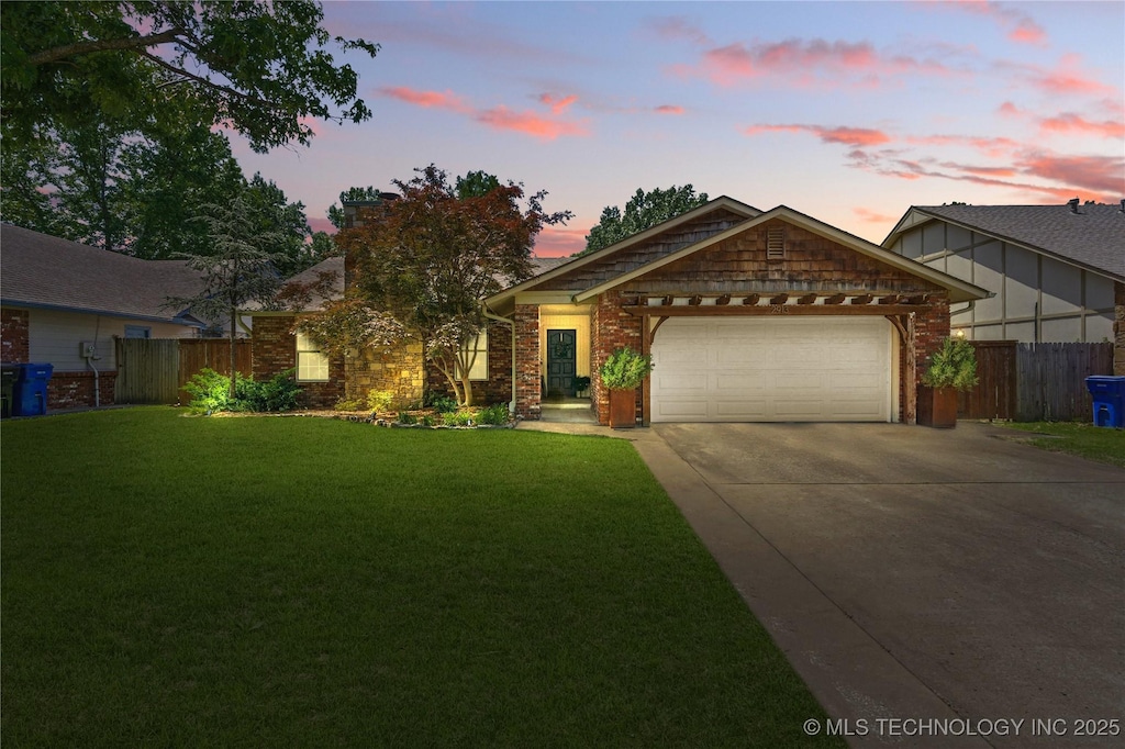 2913 W Boston St, Broken Arrow, OK 74012 - view of front facade featuring concrete driveway, a garage, and brick siding