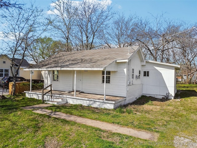 416 S Cedar St, Owasso, OK 74055 - view of front of property featuring a front lawn, roof with shingles, and covered porch