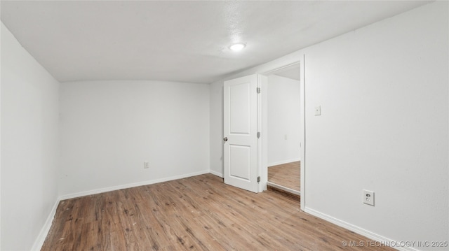 416 S Cedar St, Owasso, OK 74055 - unfurnished bedroom featuring light wood-type flooring and baseboards
